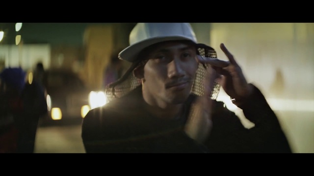 Video Reference: Photograph, Music, Snapshot, Photography, Eyewear, Human, Headgear, Fedora, Gentleman, Movie, Person, Indoor, Photo, Woman, Man, Holding, Front, Young, Wearing, Girl, Table, Food, Hat, White, Blurry, Video, Room, Pizza, Standing, Human face, Fashion accessory, Screenshot, Concert, Cowboy hat, Clothing, Musical instrument, Guitar