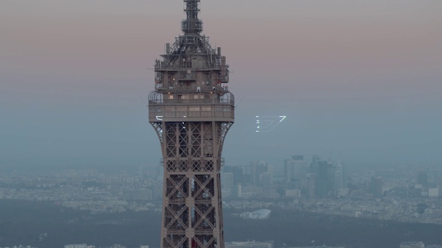 Video Reference: Landmark, Tower, Atmospheric phenomenon, Skyscraper, Metropolis, City, Architecture, Observation tower, Spire, Building, Outdoor, Water, Mountain, Large, Background, View, Boat, Body, Ship, River, Clock, Front, White, Tall, Ocean, Lake, Bridge, Flying, Fog, Sky