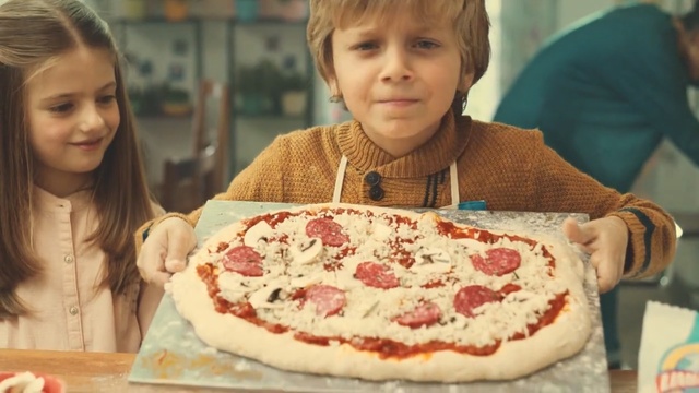 Video Reference: pizza, cuisine, dish, food, torte, baking, eating, baked goods, italian food, pavlova, Person