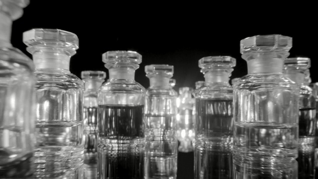 Video Reference: Transparent material, Glass, Water, Bottle, Product, Glass bottle, Reflection, Photography, Drinkware, Still life photography, Person