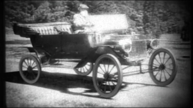 Video Reference: car, motor vehicle, black and white, vehicle, vintage car, mode of transport, monochrome photography, automotive design, carriage, wagon