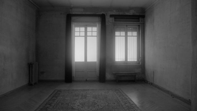 Video Reference: White, Black, Property, Room, Black-and-white, Building, Monochrome, Daylighting, Floor, Architecture, Window, Indoor, Sitting, Photo, Door, View, Small, Bench, Old, Kitchen, Large, Living, Sink, Bed, Man, Tub, Stove, Bedroom, Standing, Black and white, House, Abandoned, Tile, Tiled