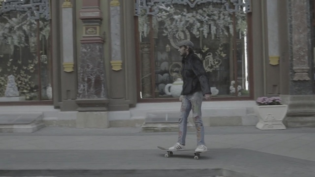 Video Reference: White, Standing, Skateboard, Snapshot, Fashion, Skateboarding Equipment, Recreation, Photography, Pedestrian, Longboard, Person