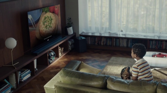 Video Reference: Room, Living room, Furniture, Interior design, Couch, Floor, House, Table, Child, Home