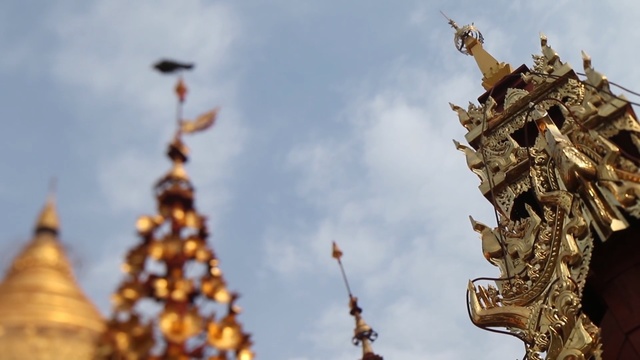 Video Reference: sky, spire, tree, temple, temple, tradition, place of worship, building, stock photography, religion, Person