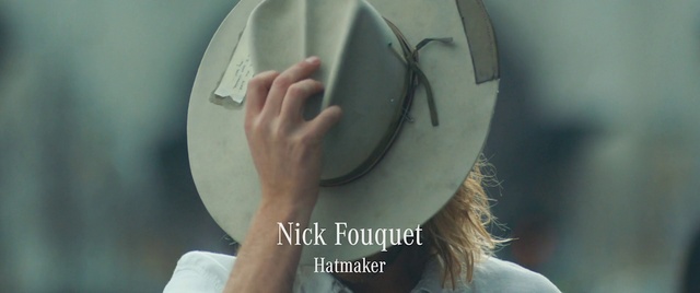 Video Reference: Hand, Hat, Arm, Headgear, Finger, Circle, Cap, Fashion accessory, Photo caption