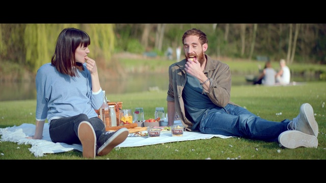 Video Reference: Sitting, Friendship, Fun, Leisure, Grass, Picnic, Conversation, Recreation, Happy, Sharing, Person, Outdoor, Woman, Bench, Man, Looking, People, Park, Table, Young, Girl, Talking, Laptop, Glasses, Riding, Phone, Holding, Group, Playing, White, Laying, Clothing, Smile, Human face, Bottle