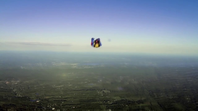 Video Reference: Aerial photography, Sky, Atmospheric phenomenon, Atmosphere, Parachute, Air sports, Extreme sport, Horizon, Parachuting, Photography