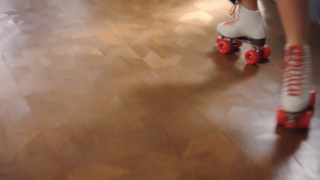 Video Reference: Floor, Red, Flooring, Hardwood, Laminate flooring, Roller skates, Footwear, Wood flooring, Child, Toddler