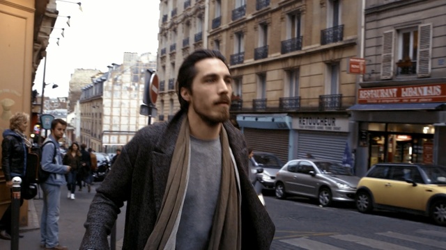 Video Reference: street, road, infrastructure, car, city, building, vehicle, pedestrian, facial hair, family car, Person