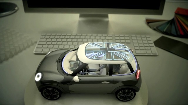 Video Reference: car, motor vehicle, vehicle, automotive design, mode of transport, city car, mini e, concept car, automotive exterior, vehicle door, Person
