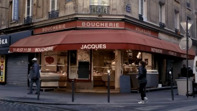 Video Reference: street, facade, downtown, building, city, café, business, restaurant, Person