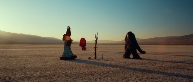 Video Reference: Horizon, Sky, Landscape, Calm, Desert, Rock, Tree, Photography, Tourism, Vacation, Person, Outdoor, Beach, Water, Sunset, Walking, Ocean, Man, Sun, Sandy, Standing, Covered, Sitting, Cross, Sand, Hill, Flying, Kite, Fire, Air, Red, Holding, Board, People, Snow, Hydrant, Ground, Clothing, Woman, Shore, Day