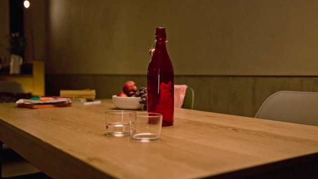 Video Reference: table, drink, restaurant, furniture, tableware, drinkware, bottle, interior design, wine