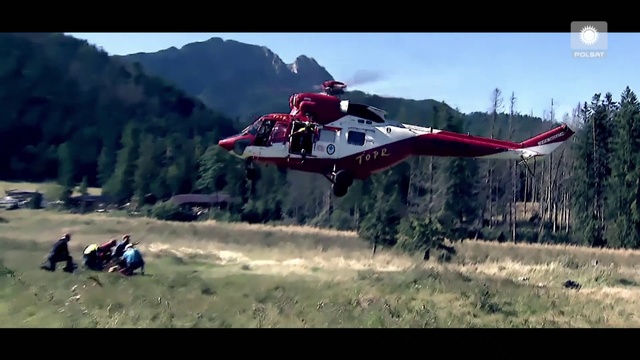 Video Reference: Vehicle, Helicopter, Rotorcraft, Extreme sport, Helicopter rotor, Freestyle motocross, Mountain range, Aircraft, All-terrain vehicle, Adventure, Outdoor, Grass, Red, Plane, Air, Flying, Mountain, Airplane, Field, Small, Jumping, Man, Riding, Runway, Hill, Skiing, Large, Jet, Ramp, Fighter, Grassy, Smoke, Doing, Trick, Sky, Screenshot