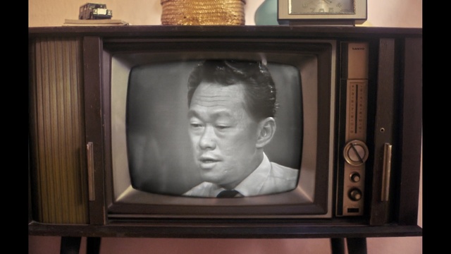 Video Reference: Television set, Screen, Television, Media, Picture frame, Analog television, Room, Furniture, Display device, Antique, Person