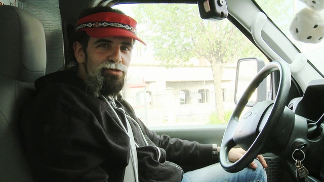 Video Reference: car, motor vehicle, vehicle, mode of transport, vehicle door, automotive design, facial hair, city car, driving, automotive exterior, Person