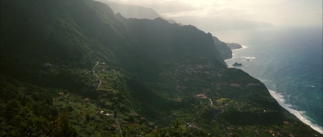 Video Reference: coast, cliff, sky, vegetation, hill station, aerial photography, terrain, highland, mount scenery, ridge