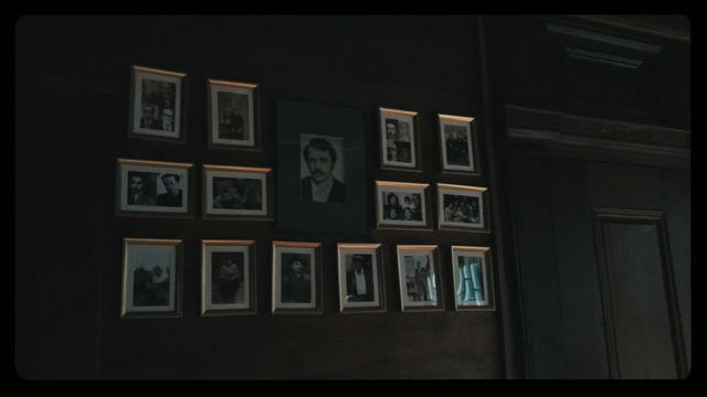 Video Reference: Black, Text, Art, Visual arts, Collection, Room, Photography, Symmetry, Darkness, Font, Person, Indoor, Photo, White, Dark, Large, Lit, Door, Night, Screen, Living, Table, Computer, Sink, Bed, Man, Standing, Picture frame, Painting