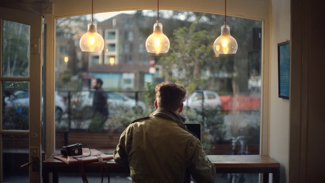 Video Reference: window, reflection, glass, restaurant, interior design, Person