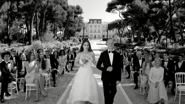 Video Reference: photograph, black and white, ceremony, monochrome photography, wedding, photography, event, aisle, dress, tree, Person