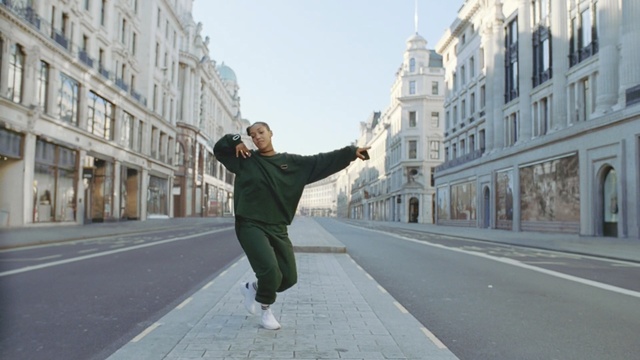 Video Reference: road, infrastructure, pedestrian, urban area, town, street, city, building, tourism, recreation, Person