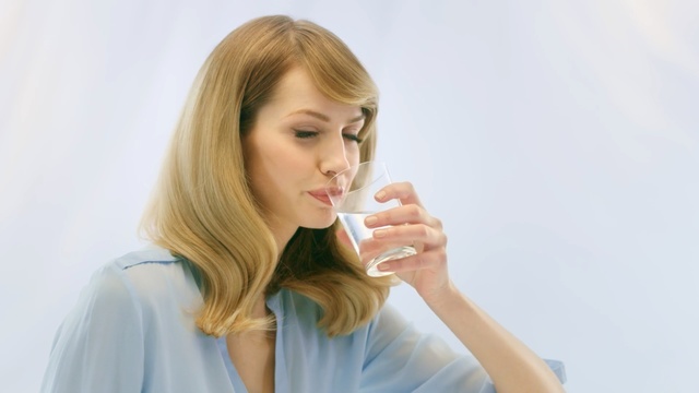 Video Reference: Hair, Lip, Skin, Blond, Beauty, Nose, Hairstyle, Chin, Drinking, Neck, Person