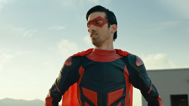 Video Reference: red, outerwear, personal protective equipment, fun, sky, sunglasses, superhero, fictional character, Person