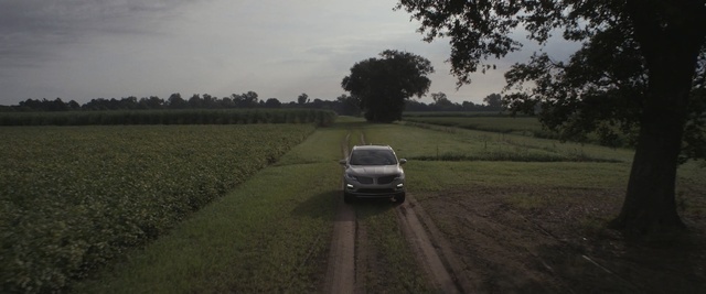 Video Reference: motor vehicle, car, golf equipment, road, sports equipment, wheeled vehicle, landscape, sky, vehicle, drive, rural, travel, equipment, jeep, grass, transportation, expressway, field, highway