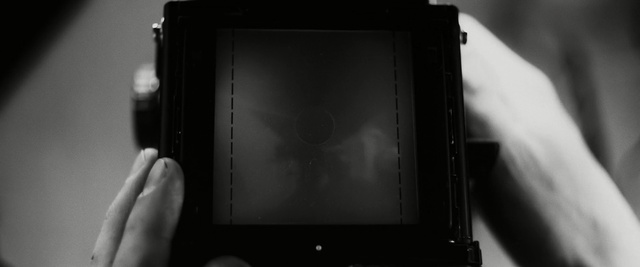 Video Reference: black, photograph, black and white, gadget, electronic device, monochrome photography, photography, technology, mobile phone, close up