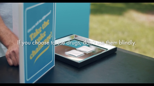 Video Reference: Product, Box, Eye, Rectangle, Advertising, Display advertising, Brand, Display case, Flooring, Glass, Person, Table, Indoor, Food, Sitting, Front, Small, Computer, Pizza, Laptop, Standing, Man, Holding, Wooden, Woman, Desk, Young, Board, Playing, Blue, Kitchen, Sign, Plate, Text, Design, Screenshot, Book