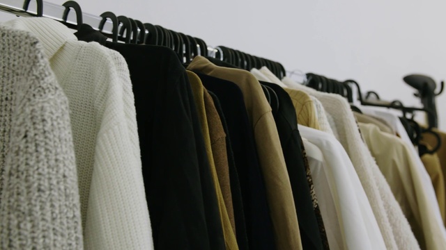 Video Reference: Clothes hanger, White, Room, Boutique, Dry cleaning, Closet, Textile, Furniture