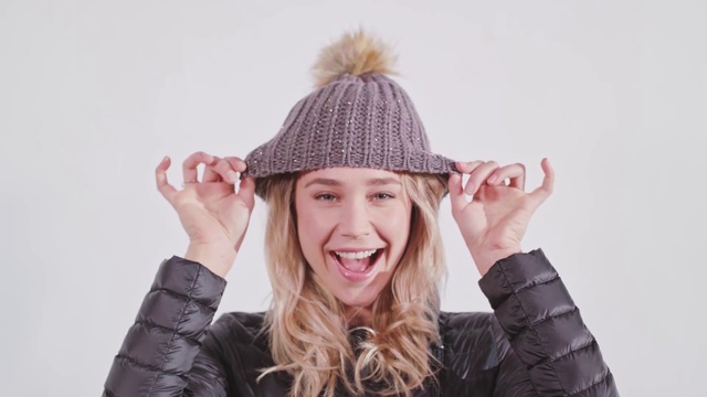 Video Reference: Beanie, Clothing, Knit cap, Fur, Headgear, Cap, Hat, Ear, Fashion accessory, Gesture