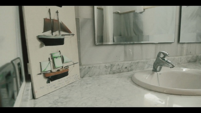 Video Reference: property, room, wall, bathroom, home, floor, countertop, tile, interior design, plumbing fixture, Person