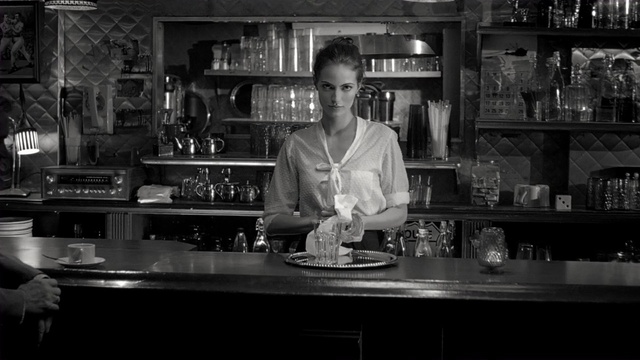 Video Reference: black, black and white, bar, monochrome photography, photography, darkness, monochrome, interior design, film noir, pub, Person