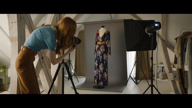 Video Reference: Photography, Tripod, Filmmaking, Art, Fashion design, Person, Indoor, Kitchen, Man, Standing, Table, Preparing, Food, Room, Woman, Refrigerator, Counter, Computer, Holding, White, Board, Oven, Stove, Clothing
