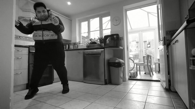 Video Reference: white, black, photograph, black and white, room, photography, snapshot, standing, monochrome photography, house, Person