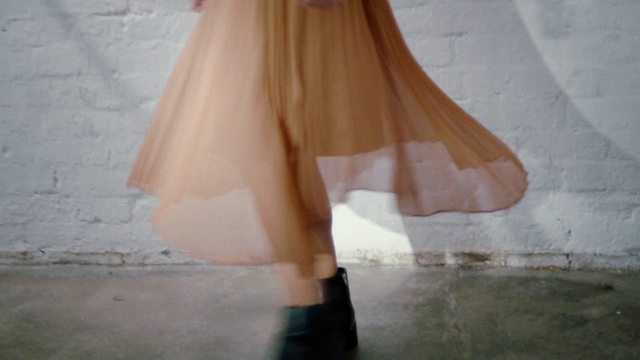 Video Reference: Clothing, Pink, Footwear, Dress, Leg, Outerwear, Beige, Shoe, Human leg