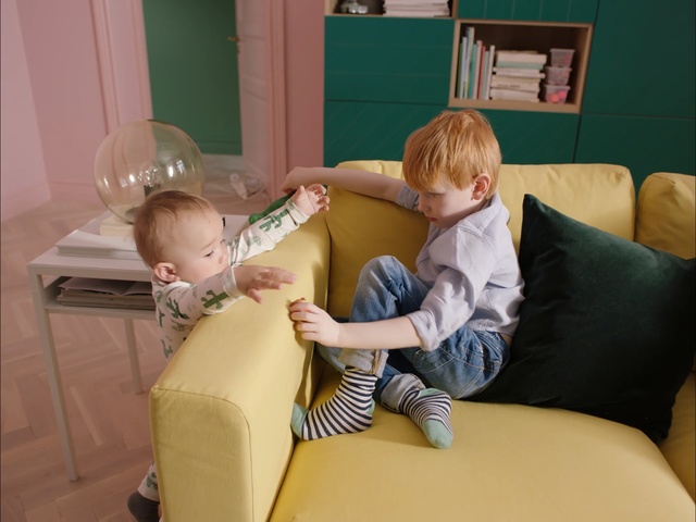 Video Reference: Child, Yellow, Toddler, Comfort, Leg, Room, Baby, Furniture, Play, Couch, Person