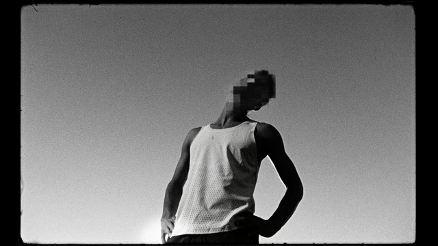 Video Reference: White, Black, Photograph, Black-and-white, Shoulder, Standing, Monochrome photography, Monochrome, Snapshot, Photography, Person, Man, Board, Monitor, Photo, Holding, Front, Surfing, Arm, Throwing, Ball, Player, Posing, Walking, Dark, Field, Screen, Riding, Shirt, Young, Trick, Baseball, Television, Wave, Doing, Water, Air, Ocean, Computer, Flying, Street, Sky, Black and white, Dance, Text, Clothing