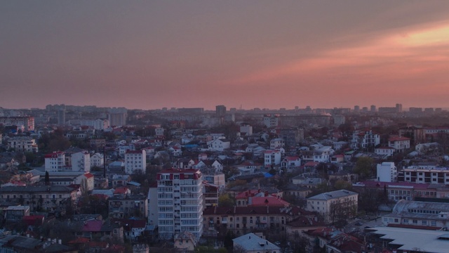 Video Reference: Metropolitan area, Cityscape, Urban area, Sky, City, Metropolis, Human settlement, Atmospheric phenomenon, Skyline, Suburb