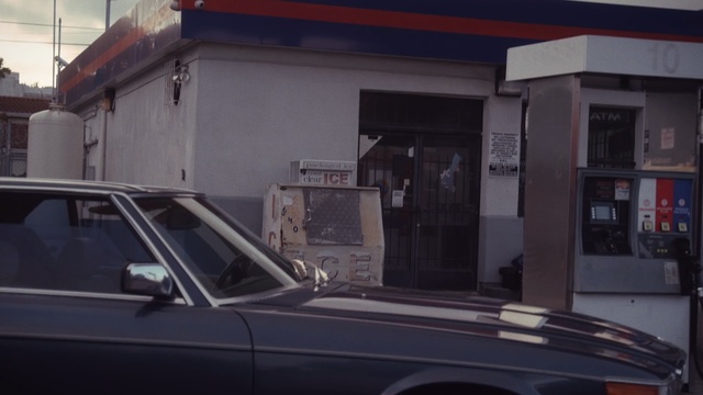 Video Reference: car, vehicle, mode of transport, family car, automotive exterior, full size car, sedan, building, performance car, garage