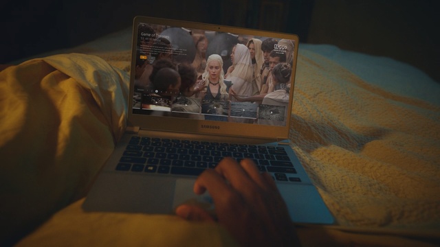 Video Reference: Laptop, Technology, Electronic device, Screen, Hand, Netbook, Display device, Personal computer, Animation, Space, Indoor, Computer, Sitting, Bed, Table, Lap, Using, Open, Small, Desk, Looking, Front, Man, Room, Keyboard, Laying, Young, Phone, Cat, White, Text, Computer keyboard