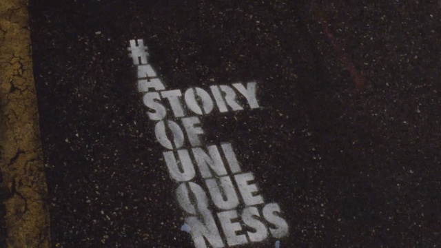 Video Reference: text, font, asphalt, darkness, night, computer wallpaper, art, space, road surface, Person