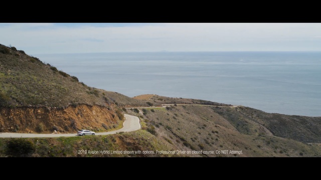Video Reference: Mountainous landforms, Coast, Headland, Highland, Hill, Cliff, Terrain, Sky, Sea, Mountain