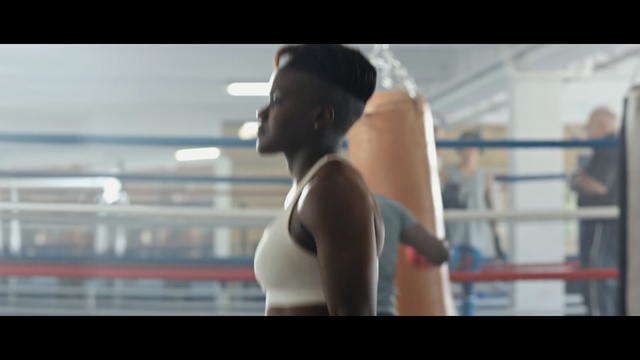 Video Reference: boxing, snapshot, girl, shoulder, hand, arm, sport venue, joint, boxing equipment, muscle