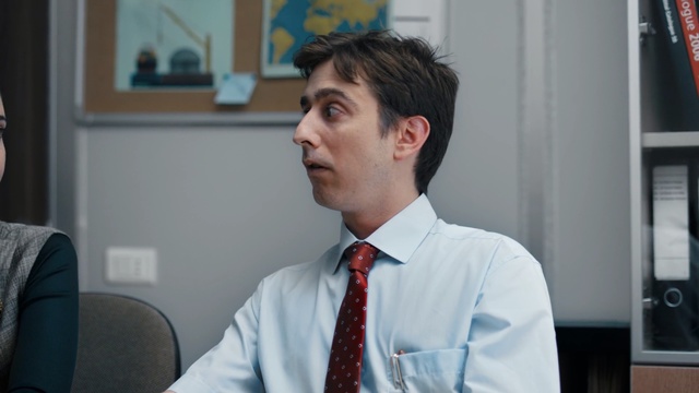 Video Reference: necktie, bow tie, garment, suit, man, businessman, male, professional, clothing, business, tie, person, portrait, handsome, executive, office