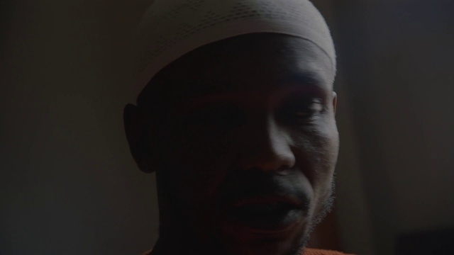 Video Reference: Face, Head, Forehead, Nose, Chin, Human, Facial hair, Portrait, Mouth, Headgear
