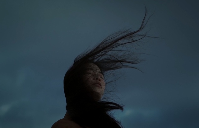 Video Reference: sky, cloud, darkness, atmosphere, girl, meteorological phenomenon, wind, tree, backlighting, sea