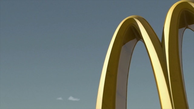 Video Reference: sky, yellow, landmark, arch, structure, fixed link, line, angle